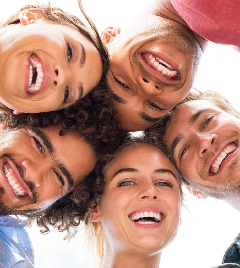 Smiling person showcasing white teeth after laser whitening treatment Portsmouth